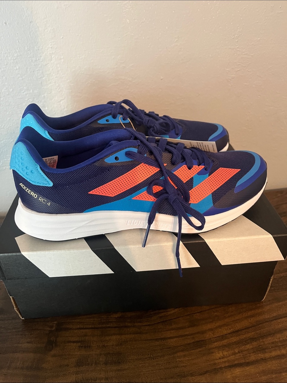 adidas Adizero Navy Blue Running Shoes with Coral and Teal Accents